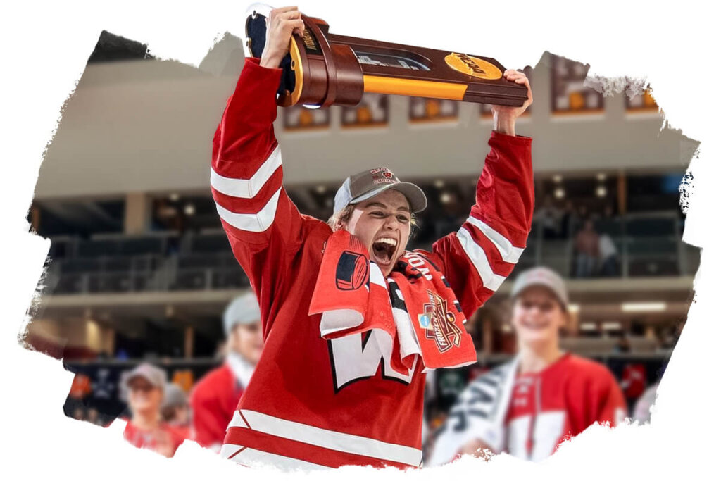 Cami Kronish holding up a trophy